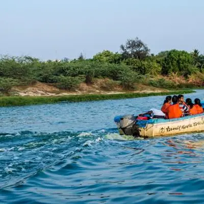 Muttukadu Beach, scenic waterfront near Chennai, popular boat house and water sports destination

